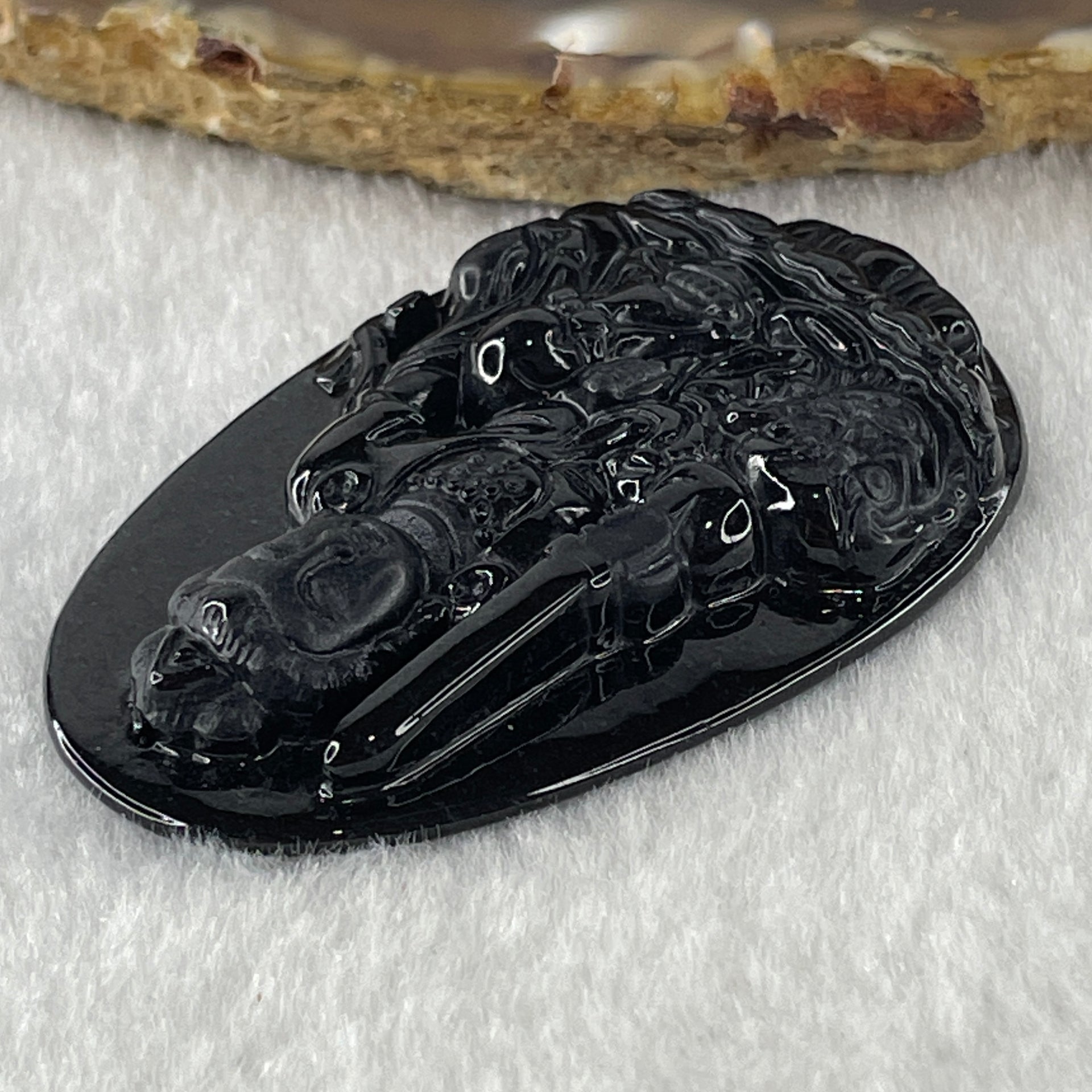 Type A Opaque to Partial Translucent Black Omphacite Jadeite Manjushri Bodhisattva Pendant Rabbit Zodiac Guardian 14.81g 51.0 by 33.8 by 7.8mm - Huangs Jadeite and Jewelry Pte Ltd