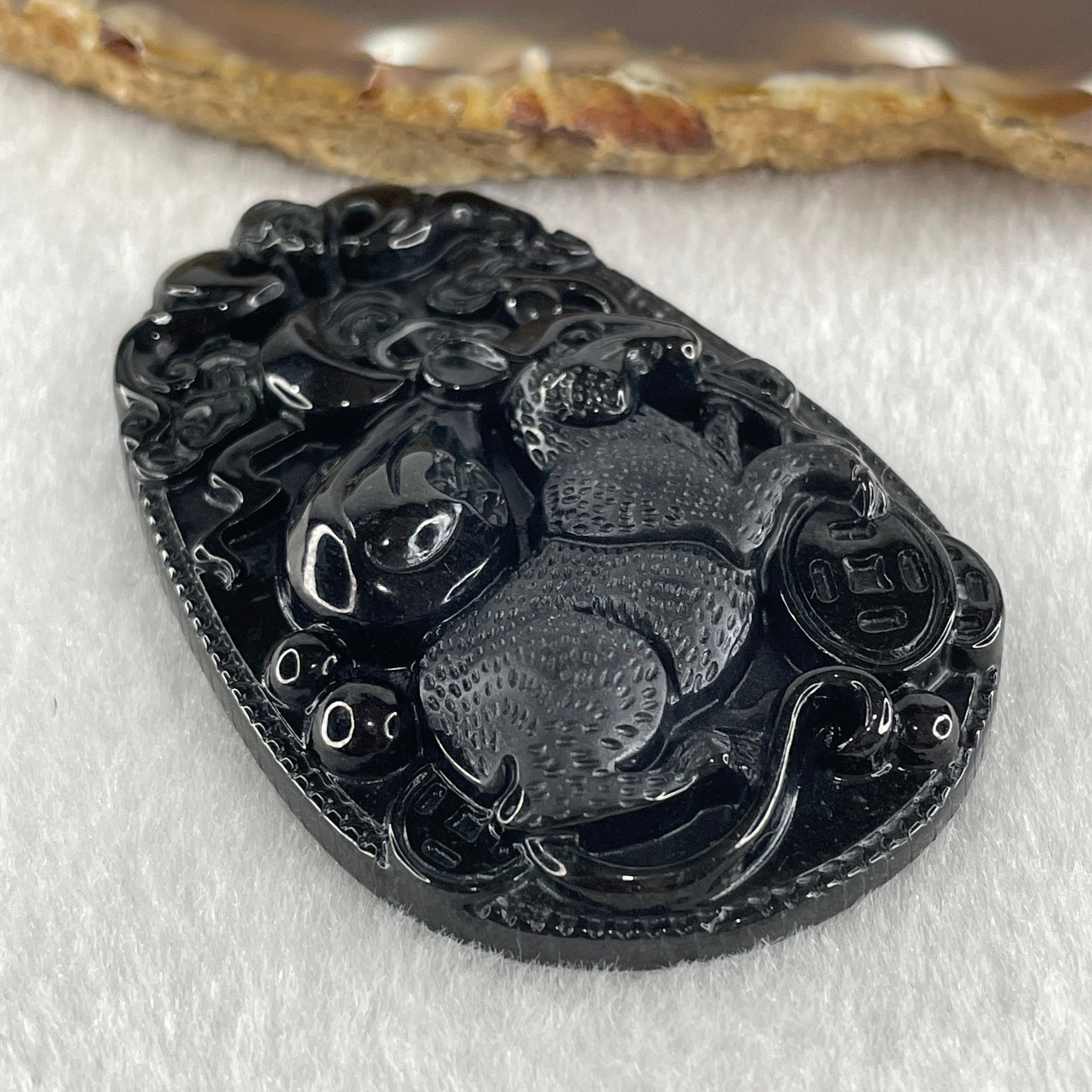 Type A Opaque to Partial Translucent Black Omphacite Jadeite Rat Pendant 25.17g 59.7 by 40.3 by 9.4mm - Huangs Jadeite and Jewelry Pte Ltd