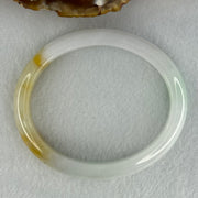 Type A Faint Lavender Green with Yellow Patches Jadeite Oval Bangle Internal Diameter 56.5mm  37.8696g 11.1 by 7.3mm (Very Slight Internal Line) - Huangs Jadeite and Jewelry Pte Ltd