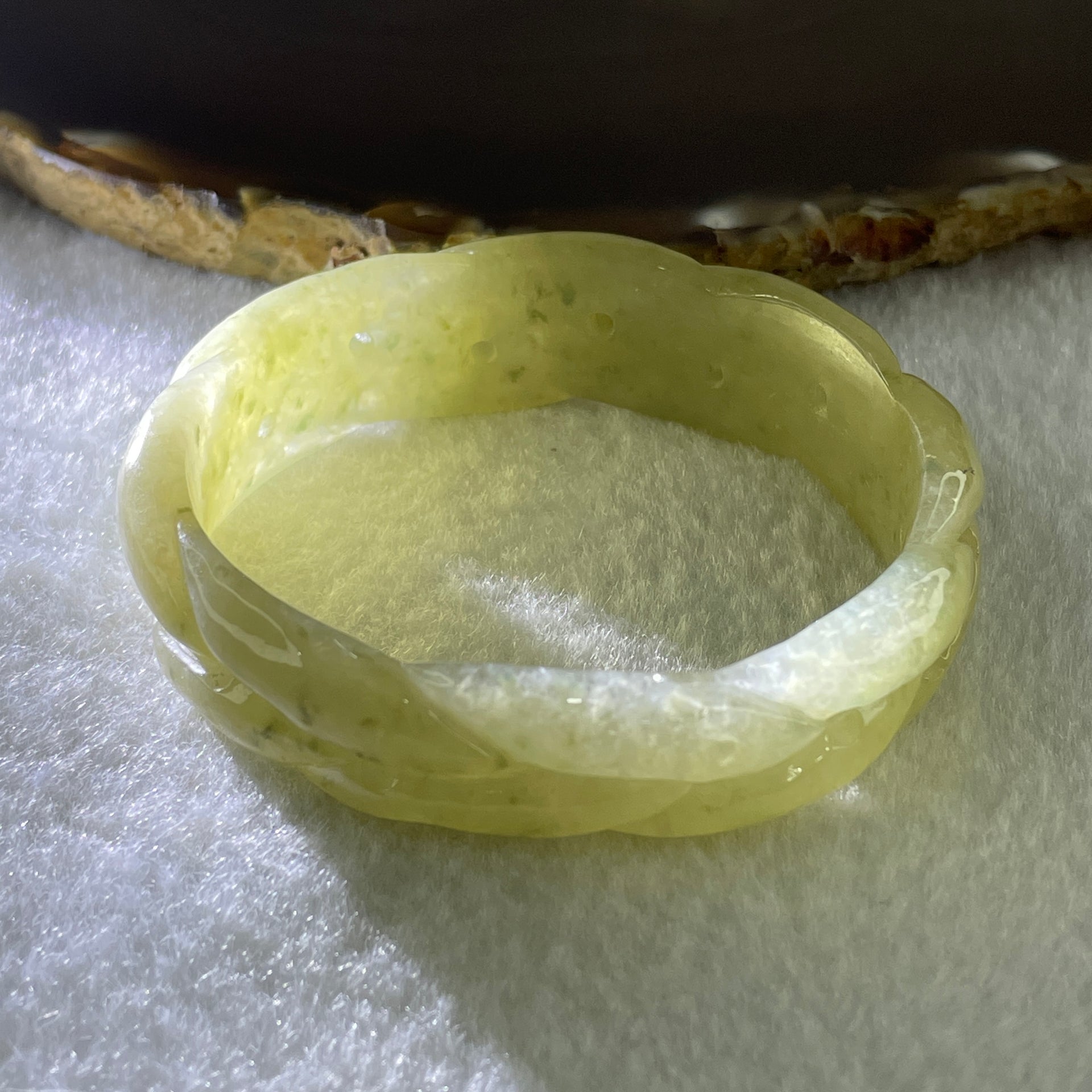 Type A Natural Yellowish Green Jadeite Oval Carved Bangle 41.73g Inner Diameter 54.2mm 16.5 by 7.1mm (Very Very Slight Internal Lines) - Huangs Jadeite and Jewelry Pte Ltd