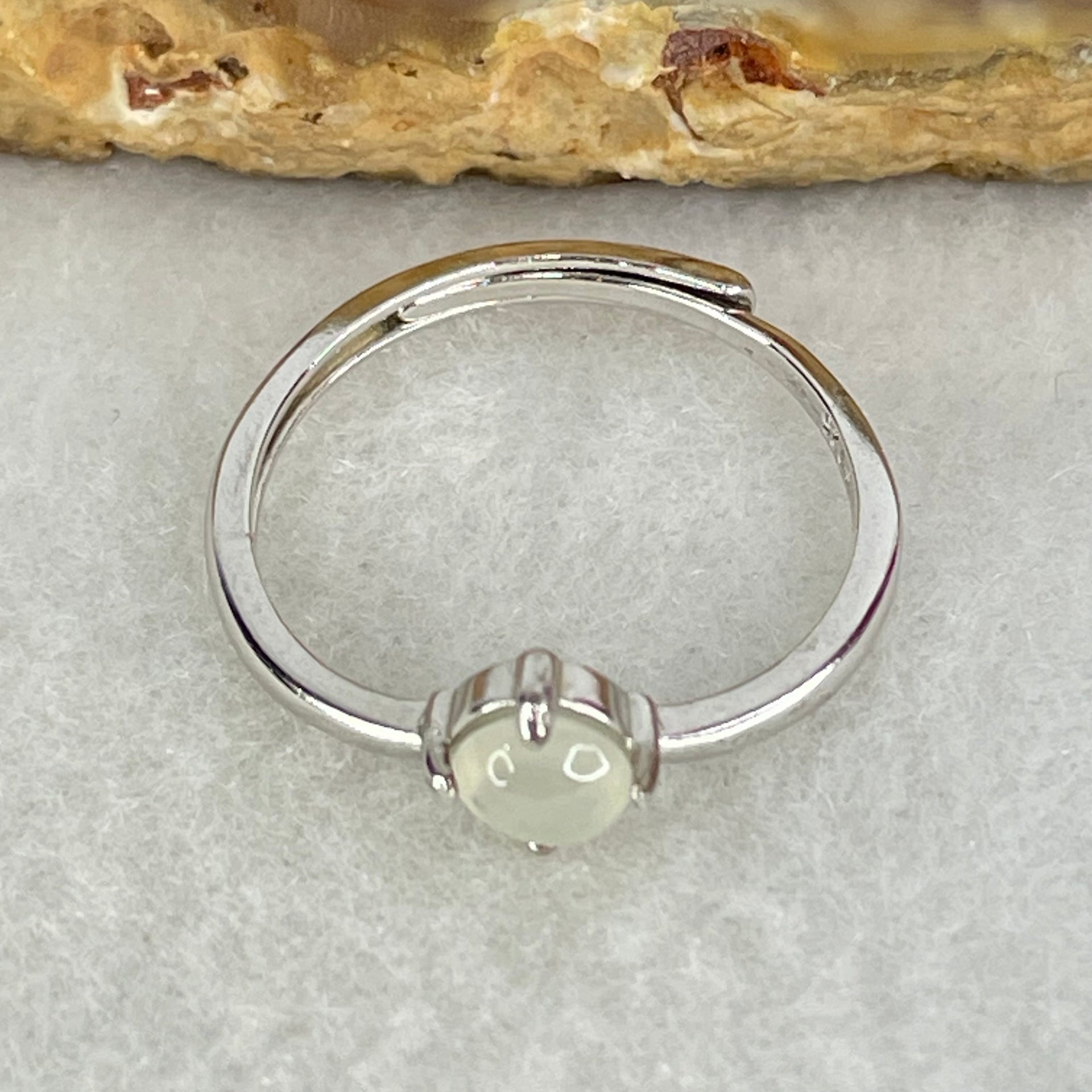 Type A Icy Faint Green Cabochon Jadeite in S925 Sliver Ring (Adjustable Size) 1.05g 4.5 by 3.0mm - Huangs Jadeite and Jewelry Pte Ltd