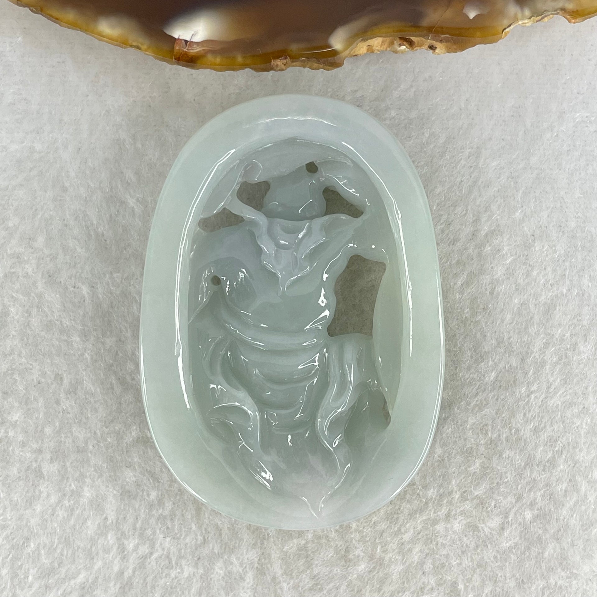 Type A Light Sky Blue Jadeite Sun Wu Kong Pendant 27.49g 52.8 by 37.1 by 11.0mm - Huangs Jadeite and Jewelry Pte Ltd