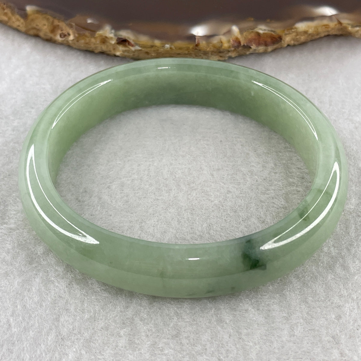 Certified Natural Type A Jelly Green Jadeite Oval Bangle | (43.99g | 55.1mm Inner Diameter | 12.5mm x 7.0mm | Close to Perfect | Radiance, Steady Wealth "Zheng Cai" Anchor & Feng Shui Prosperity Catalyst) - Huangs Jadeite and Jewelry Pte Ltd