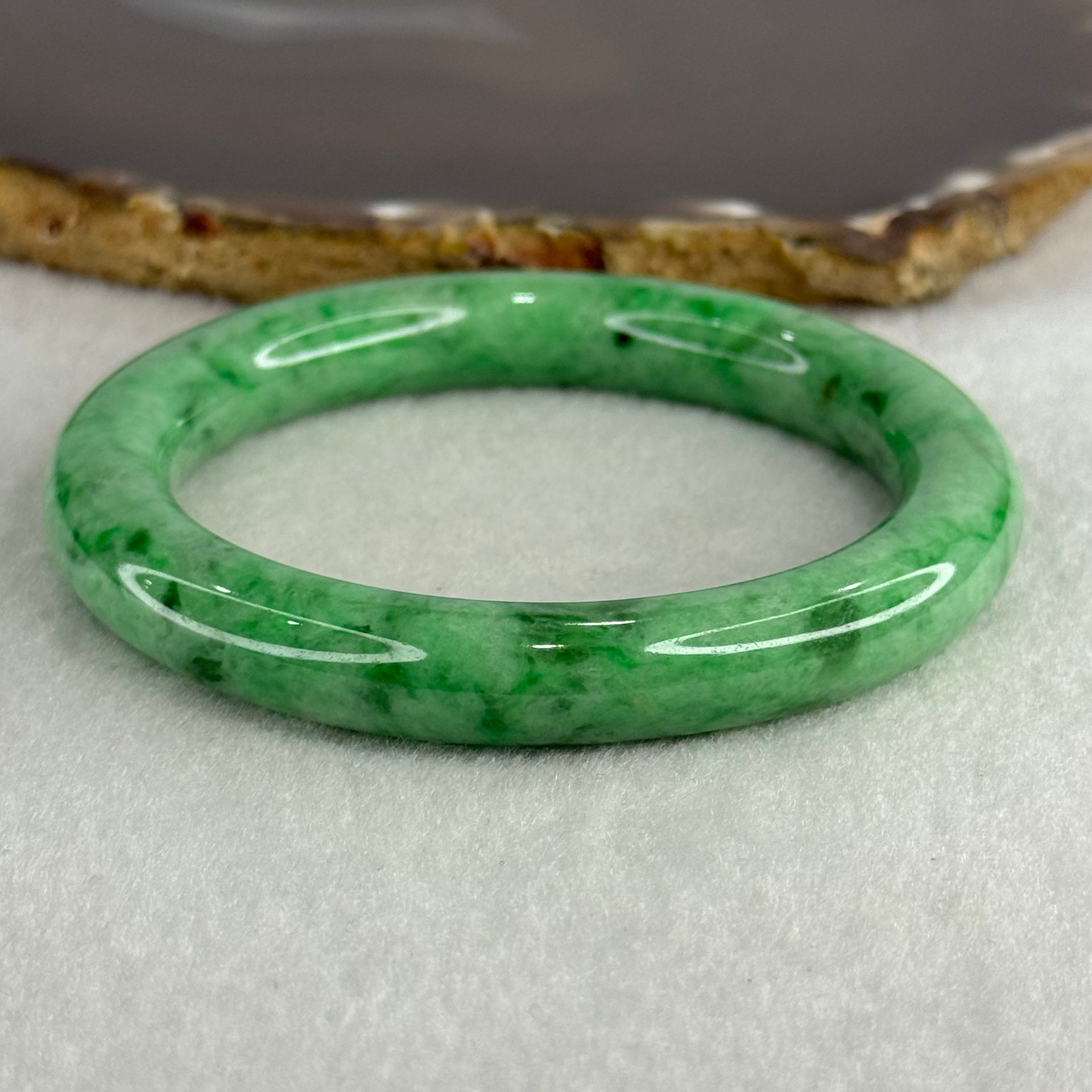 Type A Apple Green Jade Jadeite Bangle 60.77g Inner Diameter: 59.2mm Thickness: 10.2 by 10.4mm (Very Very Slight Internal Lines) - Huangs Jadeite and Jewelry Pte Ltd