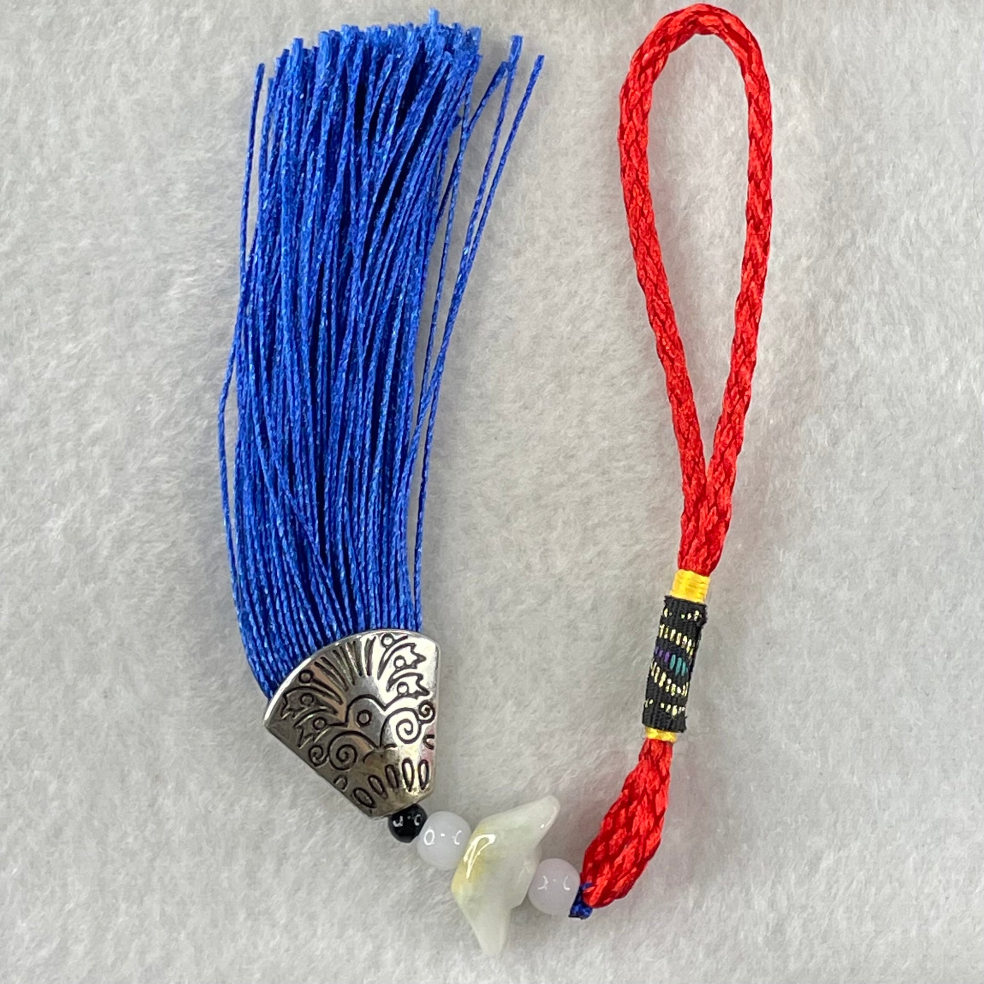 Type A Light Lavender Yellow Jadeite Yuan Bao Ingot in Red Blue String Display 4.75g 7.1 by 17.3 by 6.7mm - Huangs Jadeite and Jewelry Pte Ltd