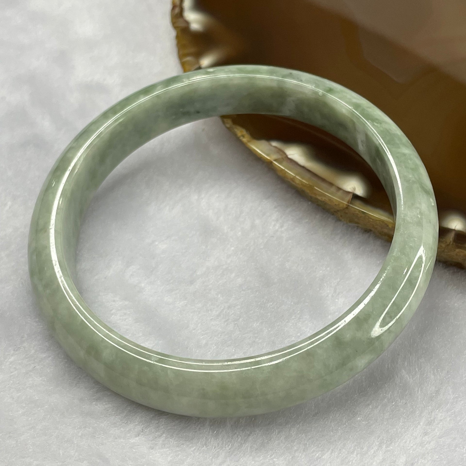 Type A Green with Spicy Green Patches Jade Jadeite Bangle 42.59g inner Dia 59.0mm 11.3 by 7.5mm (External Rough) - Huangs Jadeite and Jewelry Pte Ltd