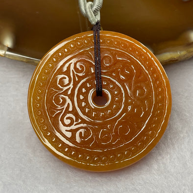 Type A Red Jade Jadeite Ping An Kou with Carving Pendant - 24.82g 45.2 by 45.2 by 5.2 mm - Huangs Jadeite and Jewelry Pte Ltd