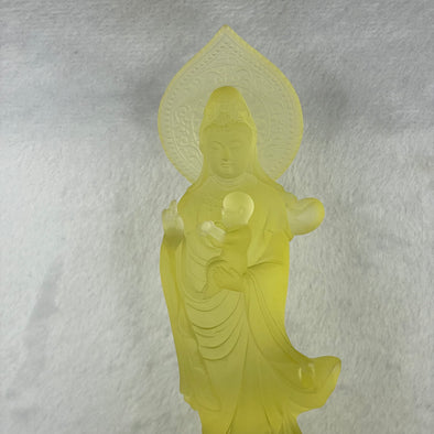 Liuli Crystal Guan yin with baby on lotus and dragon 868.2g 98.4 by 67.0 by 205.0mm - Huangs Jadeite and Jewelry Pte Ltd