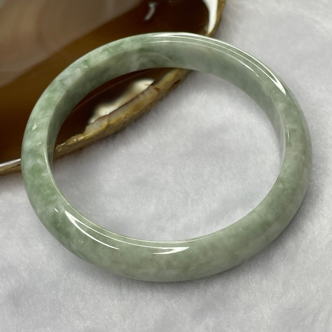 Type A Green with Spicy Green Patches Jade Jadeite Bangle 42.59g inner Dia 59.0mm 11.3 by 7.5mm (External Rough) - Huangs Jadeite and Jewelry Pte Ltd