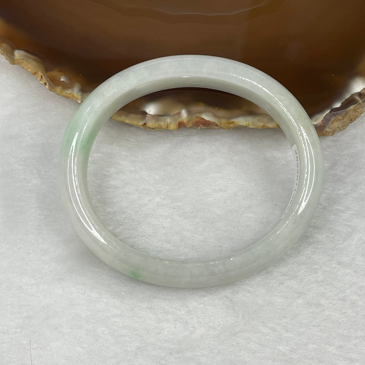 Type A Faint Green Jadeite Oval Bangle 45.98g inner diameter 55.5mm 13.9 by 6.7mm - Huangs Jadeite and Jewelry Pte Ltd