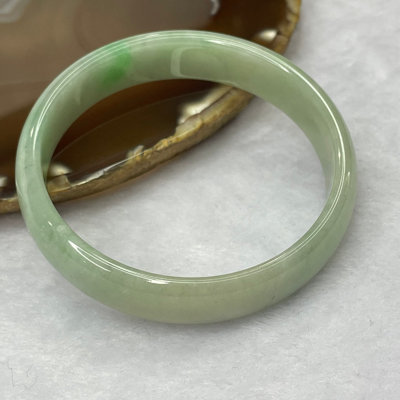 Type A Semi Icy Light Apple Green Jadeite Bangle 38.86g inner diameter 57.1mm 13.3 by 5.7mm - Huangs Jadeite and Jewelry Pte Ltd