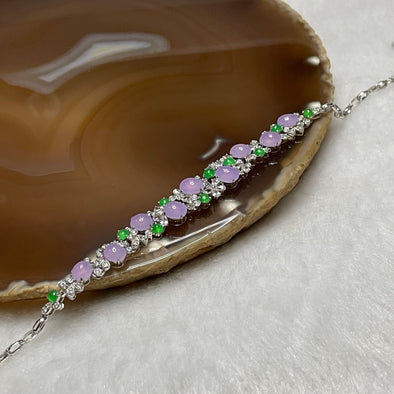 RARE Type A Semi Icy Lavender & Green Jade Jadeite Bracelet 18k white gold, natural diamonds & sapphires 7.23g Dimensions of middle piece: 88.2 by 9.2 by 4.7mm Length of Bracelet: 16cm - Huangs Jadeite and Jewelry Pte Ltd