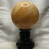 Natural Citrine Crystal Ball Display with Wooden Stand - 6555g Dimensions with Stand: 253.9 by 242.5 by 165.9mm Crystal Ball Dimensions: 139.2 by 139.2mm - Huangs Jadeite and Jewelry Pte Ltd