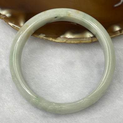 Type A Green Piao Hua Jadeite Bangle with Gold Coin Carving 41.37g inner diameter 55.1mm 12.2 by 6.6mm - Huangs Jadeite and Jewelry Pte Ltd