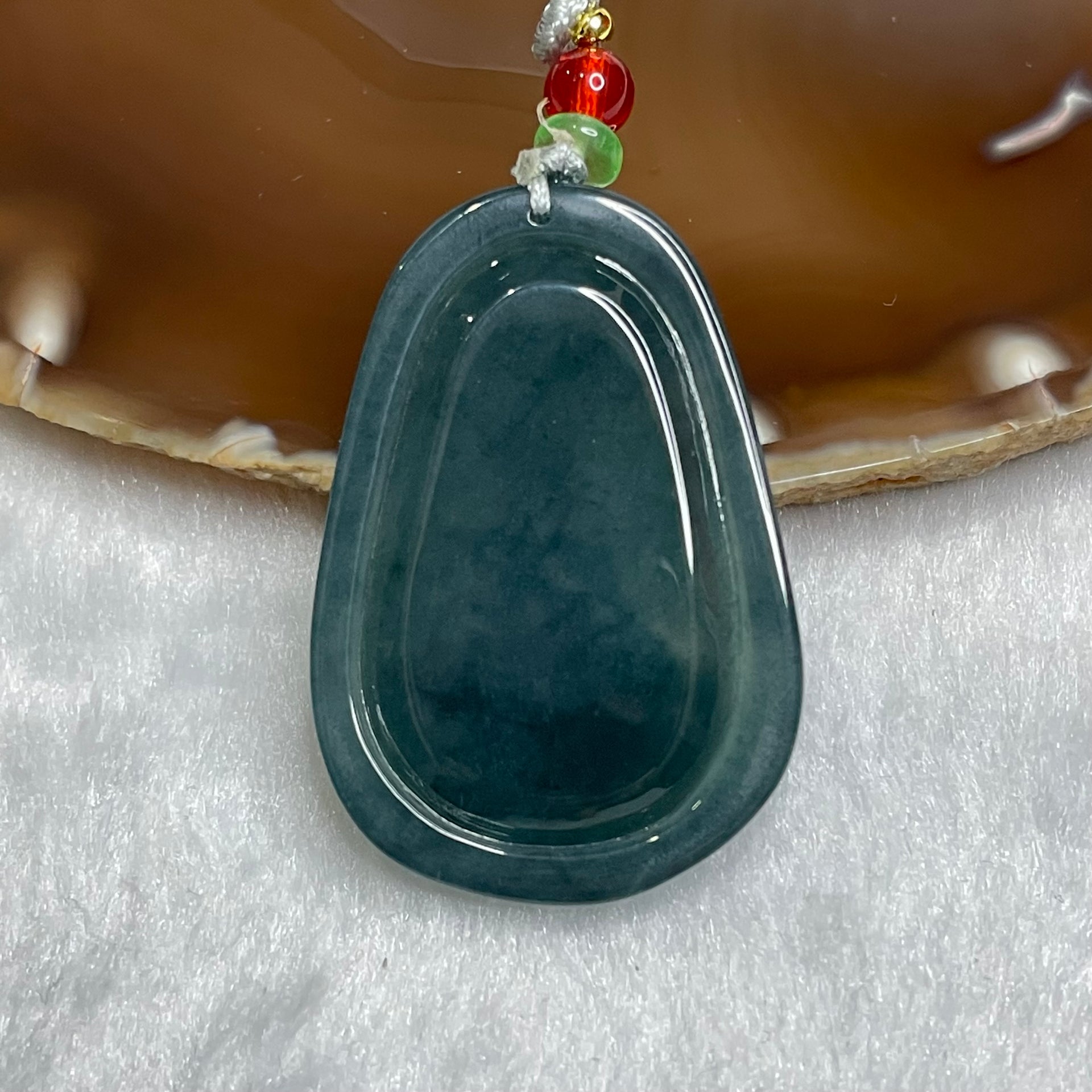 Type A Blueish Green Guan Yin Jade Jadeite 19.79g 46.2 by 30.0 by 7.5mm - Huangs Jadeite and Jewelry Pte Ltd