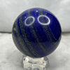 Natural Lapis Lazuli Crystal Ball Display with Stand - 1315g Dimensions with Stand: 110.0 by 92.2 by 92.2 mm Crystal Ball Dimensions: 92.2 by 92.2 mm - Huangs Jadeite and Jewelry Pte Ltd