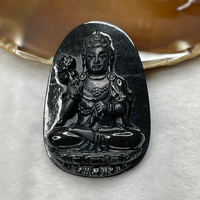 Type A Black Jade Jadeite Guan Yin holding a lotus flower 28.36g 59.7 by 39.7 by 8.6mm - Huangs Jadeite and Jewelry Pte Ltd