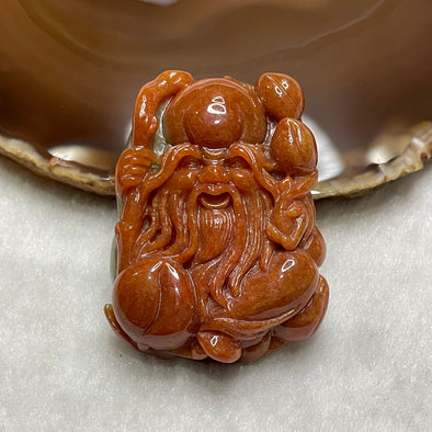 Type A Red Jade Jadeite Shou Xin Gong 65.44g 51.1 by 38.5 by 17.1mm - Huangs Jadeite and Jewelry Pte Ltd