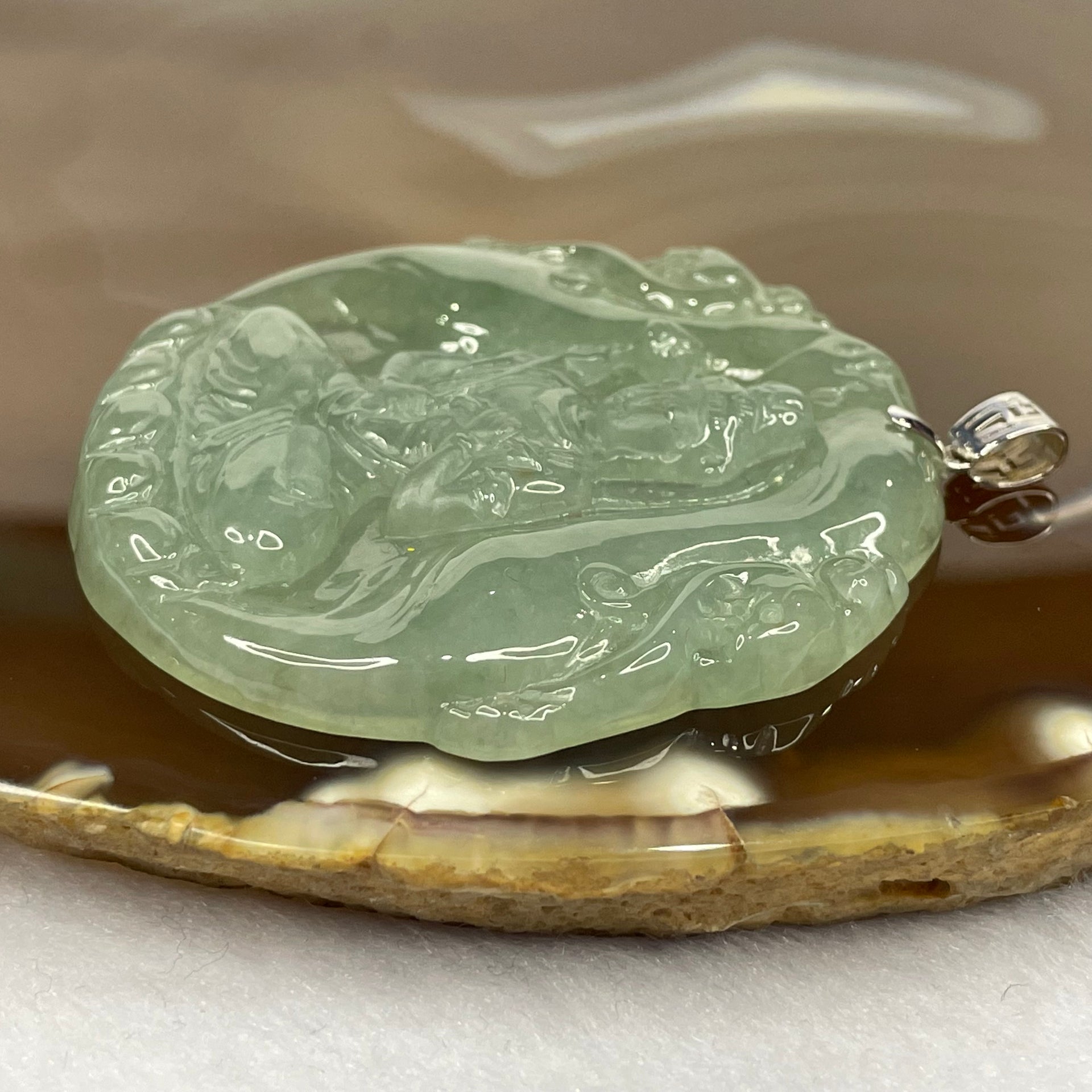 Type A Icy Green Jade Jadeite Guan Yin Pendant with 18K Gold Clasp - 26.40g 51.6 by 50.7 by 6.2mm - Huangs Jadeite and Jewelry Pte Ltd