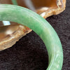 Type A Green Dou Qing Oval Bangle - 39.06g inner diameter 53.6mm Thickness 11.6 by 7.2mm - Huangs Jadeite and Jewelry Pte Ltd