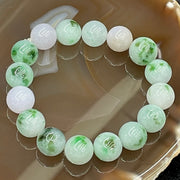 Type A Burmese Green & Lavender Floating Spicy Green Jade Jadeite Bracelet - 62.49g 13.0-14.0mm/bead 16 beads - Huangs Jadeite and Jewelry Pte Ltd