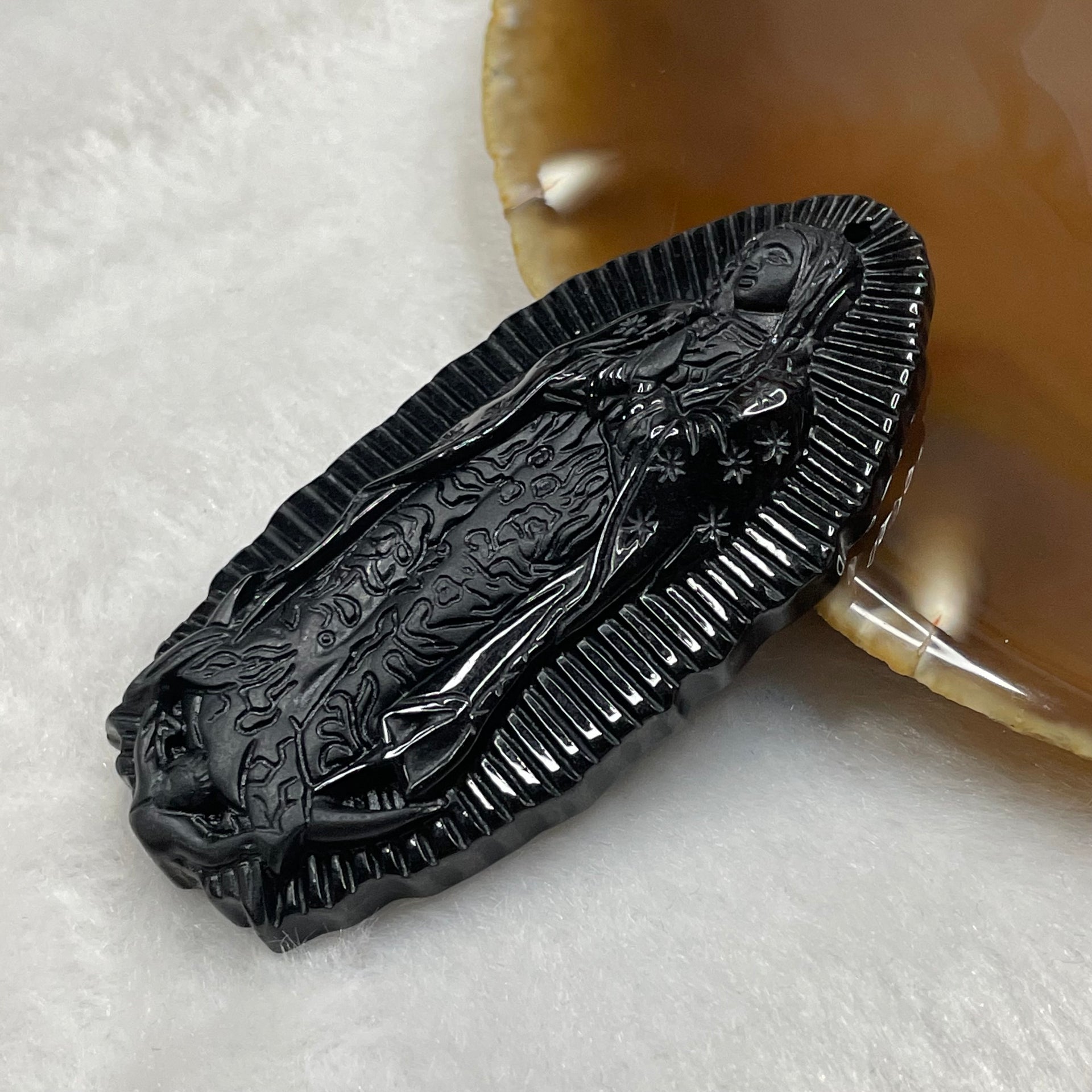 Type A Black Jade Jadeite Mother Mary 34.97g 68.7 by 33.4 by 8.2mm - Huangs Jadeite and Jewelry Pte Ltd